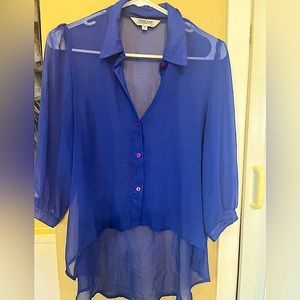 Womens sheer button down blouse with longer tail in back